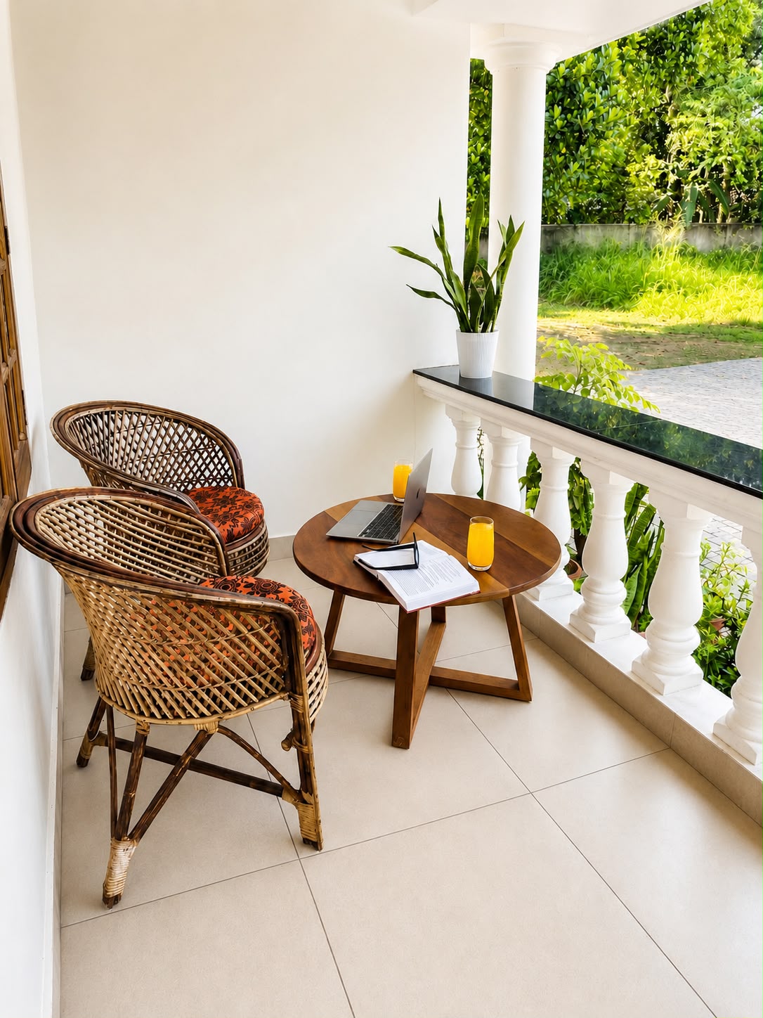 Apartment 1A balcony with orange juice